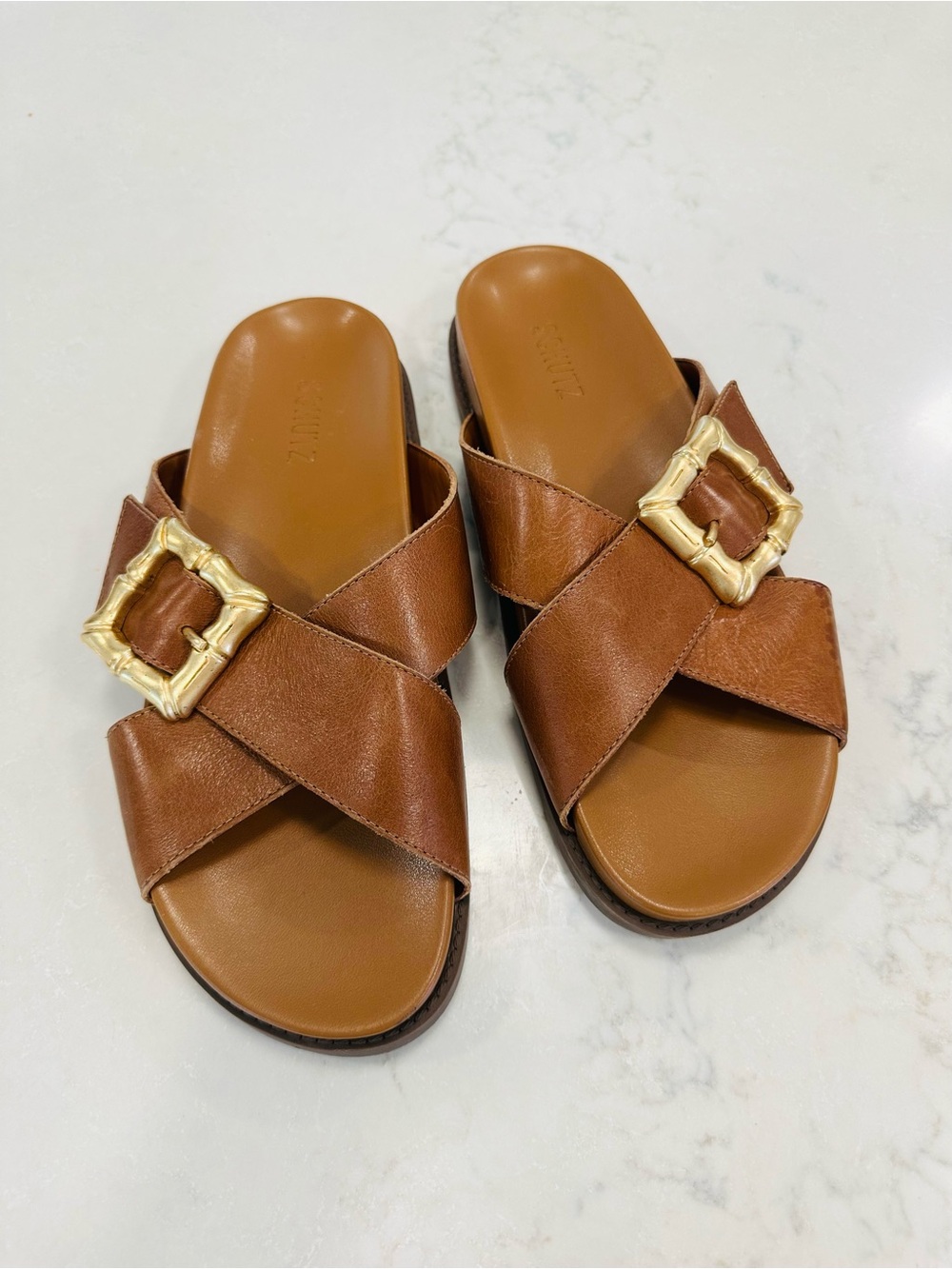 SCHUTZ Brown Leather Crisscross Slide Sandals with Gold Buckle